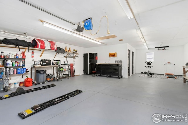 garage featuring a garage door opener