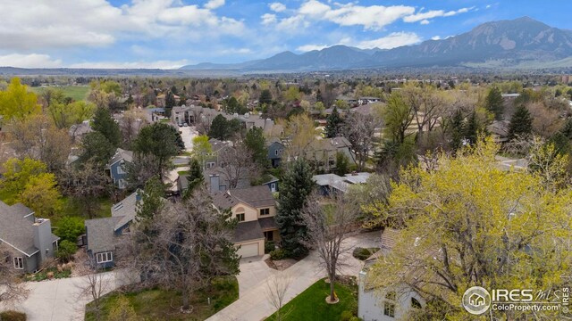 drone / aerial view featuring a mountain view and a residential view