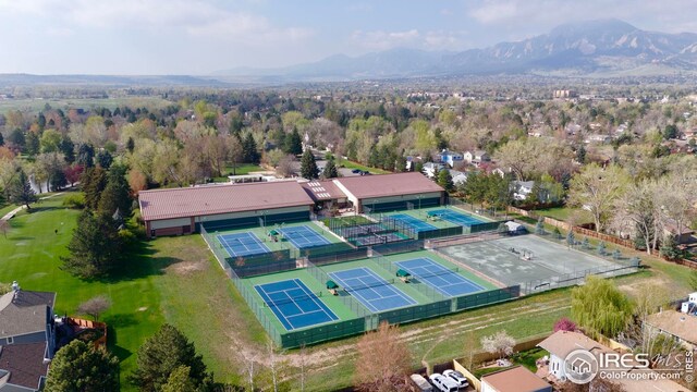 birds eye view of property with a mountain view