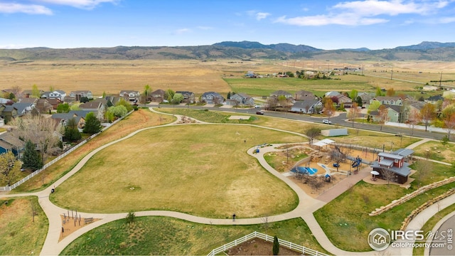 birds eye view of property featuring a residential view and a mountain view