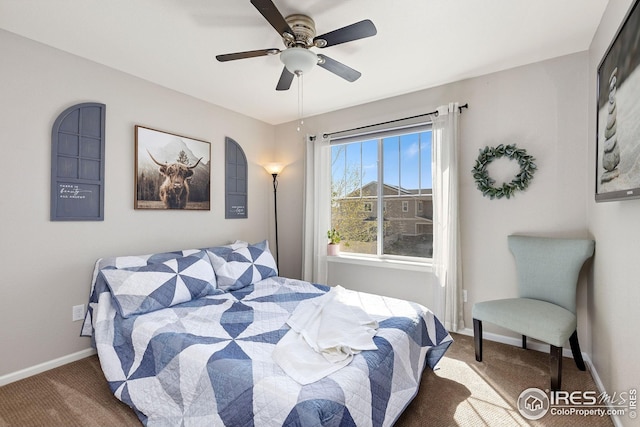 bedroom with baseboards, carpet floors, and ceiling fan