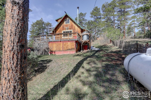 147 Cedar Dr, Lyons, CO 80540 - view of yard featuring a deck