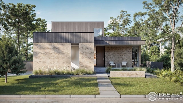 2090 Orchard Ave, Boulder, CO 80304 - modern home with brick siding and a front lawn