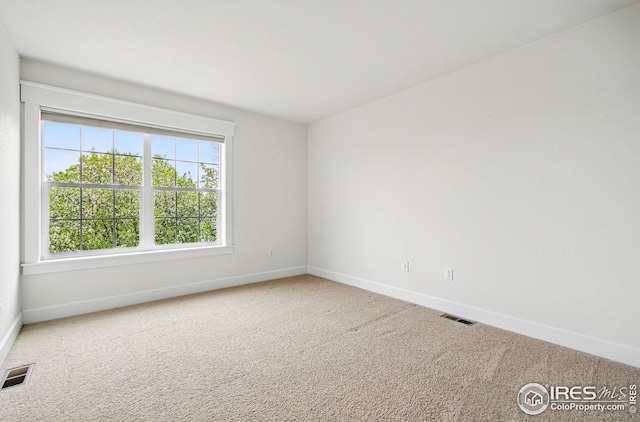 3122 Notabon Ct, Lafayette, CO 80026 - spare room featuring baseboards and carpet flooring