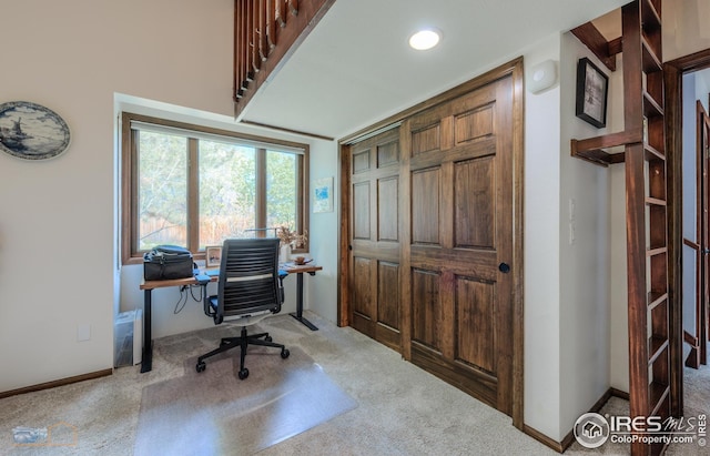 home office featuring carpet floors and baseboards