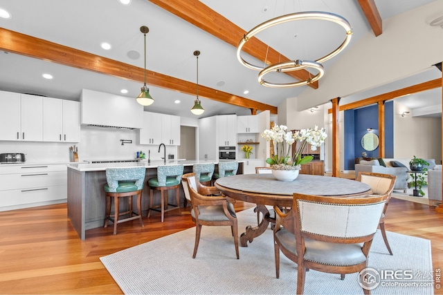1533 Old Tale Rd, Boulder, CO 80303 - dining space featuring recessed lighting, light wood-style floors, and a chandelier