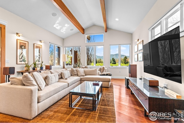 1533 Old Tale Rd, Boulder, CO 80303 - living room with dark wood-style floors, beam ceiling, plenty of natural light, and high vaulted ceiling