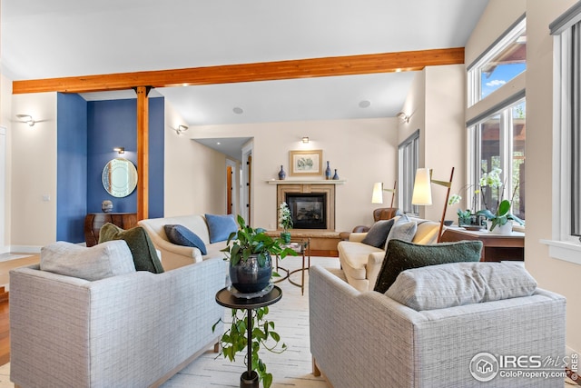 1533 Old Tale Rd, Boulder, CO 80303 - living room with beamed ceiling, wood finished floors, a glass covered fireplace, and recessed lighting