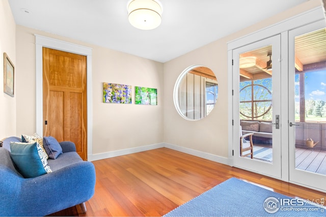 1533 Old Tale Rd, Boulder, CO 80303 - living area featuring wood finished floors and french doors