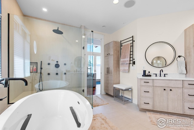 1533 Old Tale Rd, Boulder, CO 80303 - full bath with a freestanding tub, a stall shower, vanity, tile patterned floors, and recessed lighting