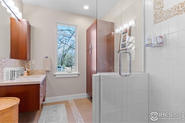1533 Old Tale Rd, Boulder, CO 80303 - full bath with vanity, a tile shower, decorative backsplash, and recessed lighting