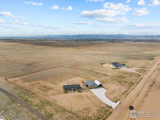 aerial view with a rural view and a mountain view