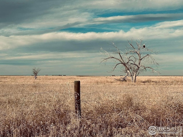 property view of water with a rural view