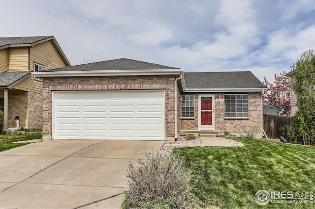 ranch-style house featuring a garage, brick siding, roof with shingles, concrete driveway, and fence