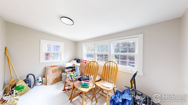 dining area with vaulted ceiling