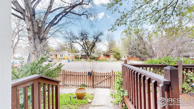 view of yard with fence and a residential view