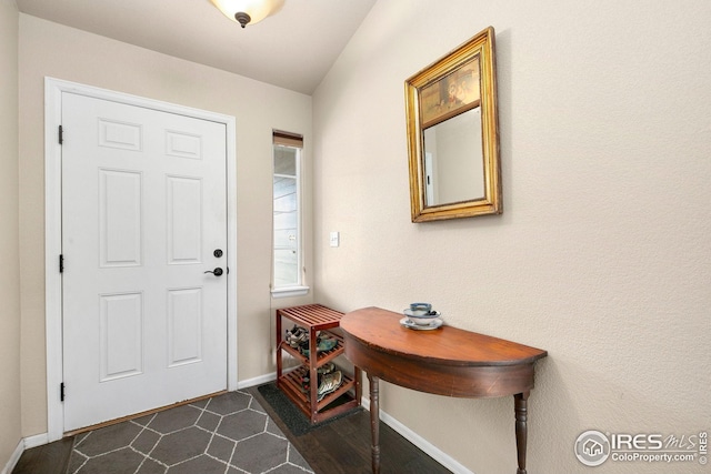 entrance foyer featuring baseboards