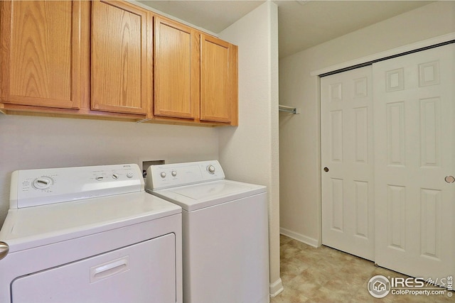 3740 Ponderosa Ct Unit 2, Evans, CO 80620 - laundry area featuring washer and dryer, cabinet space, and baseboards