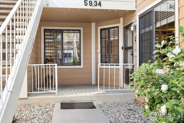 doorway to property with a porch