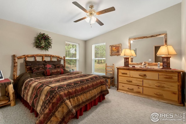 bedroom featuring ceiling fan, light carpet, and lofted ceiling