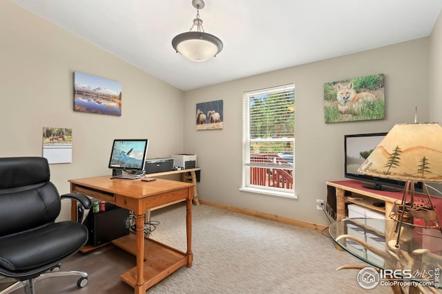 carpeted office featuring baseboards