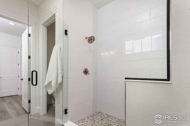 full bathroom with a walk in shower