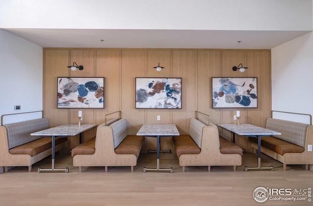 interior space with wood finished floors and breakfast area