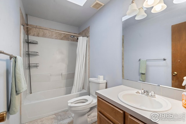 full bathroom with shower / bath combo, stone finish flooring, toilet, vanity, and visible vents