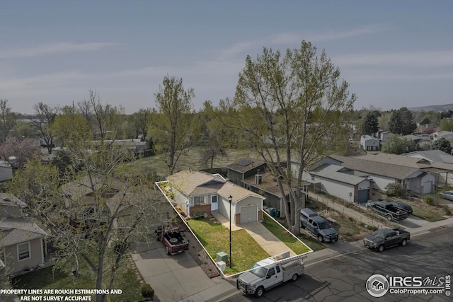 bird's eye view with a residential view
