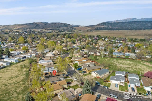 bird's eye view featuring a mountain view and a residential view