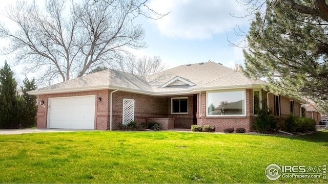 single story home with brick siding, a garage, roof with shingles, a front lawn, and concrete driveway