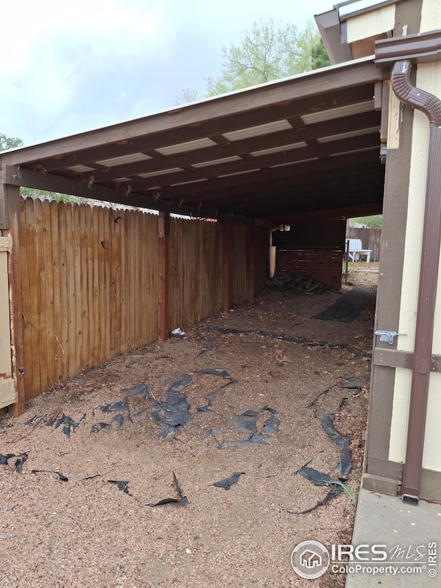 view of car parking with a carport