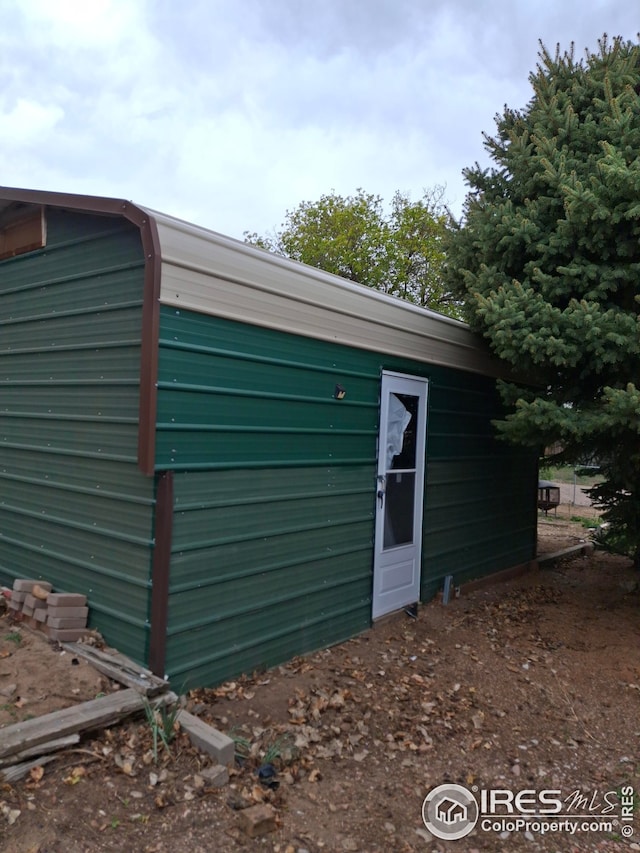 view of outbuilding featuring an outdoor structure