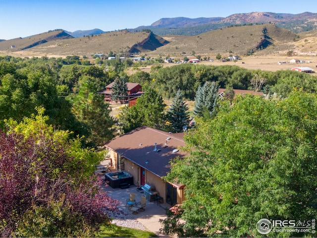bird's eye view with a mountain view