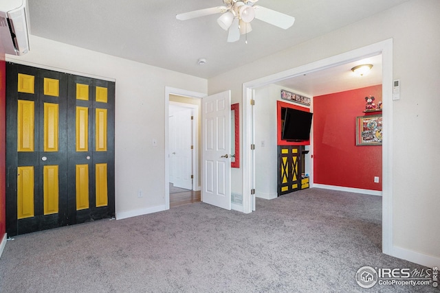 unfurnished bedroom with baseboards, ceiling fan, and carpet flooring