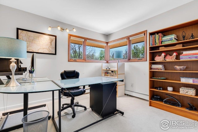 office with a baseboard radiator and light carpet