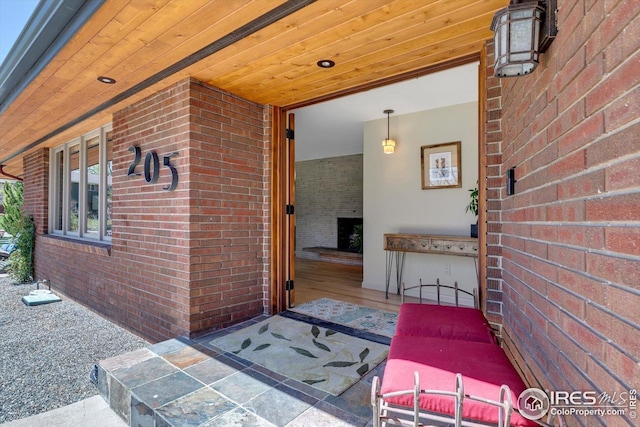 exterior space featuring brick siding