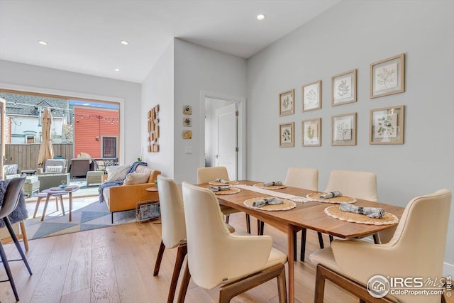 dining area featuring recessed lighting and light wood finished floors