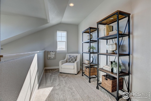 208 High Point Dr, Longmont, CO 80504 - living area with carpet flooring, recessed lighting, baseboards, and vaulted ceiling