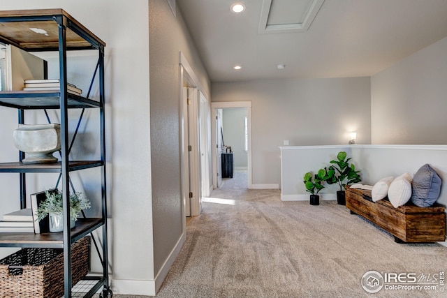 208 High Point Dr, Longmont, CO 80504 - hallway with carpet floors, recessed lighting, baseboards, and attic access