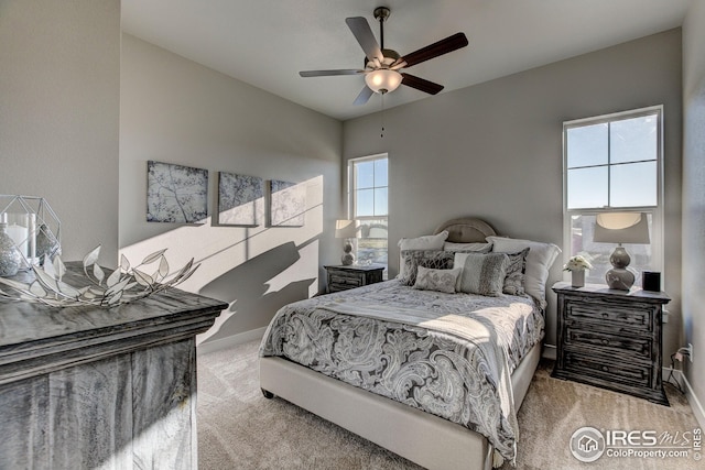 208 High Point Dr, Longmont, CO 80504 - carpeted bedroom with baseboards and ceiling fan