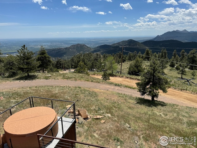 view of mountain feature with a rural view
