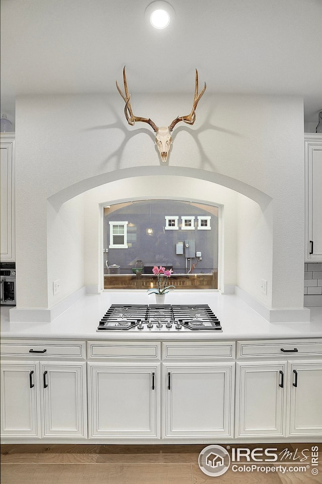 bar with stainless steel gas stovetop