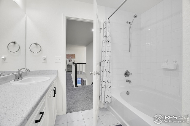 full bathroom featuring tile patterned flooring, shower / tub combo, and vanity
