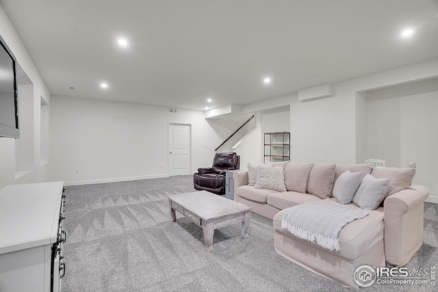 living room featuring carpet floors, recessed lighting, baseboards, and visible vents
