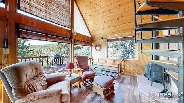 76 Cairn Ct, Drake, CO 80515 - interior space featuring wooden walls, high vaulted ceiling, and a healthy amount of sunlight