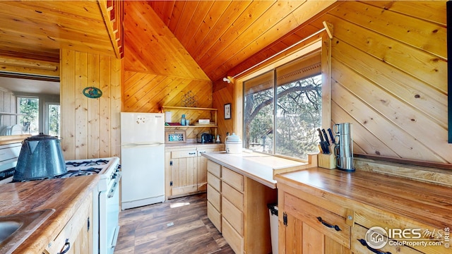 76 Cairn Ct, Drake, CO 80515 - kitchen with a healthy amount of sunlight, wood counters, white appliances, and wood finished floors