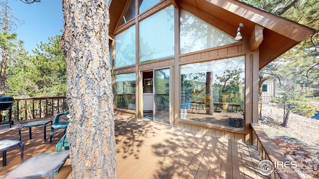 76 Cairn Ct, Drake, CO 80515 - wooden deck featuring a sunroom
