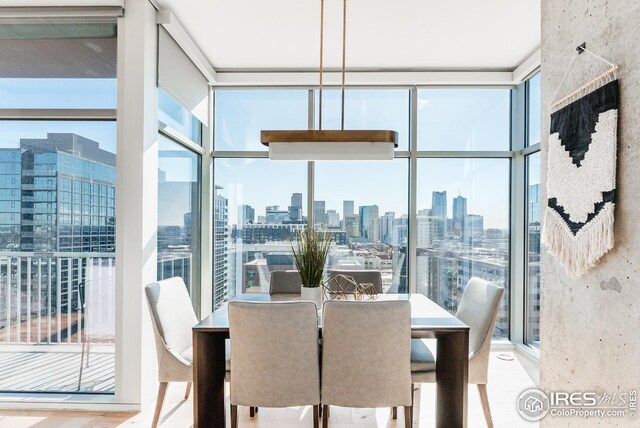 1700 Bassett St Unit 1808, Denver, CO 80202 - dining space with floor to ceiling windows and a city view