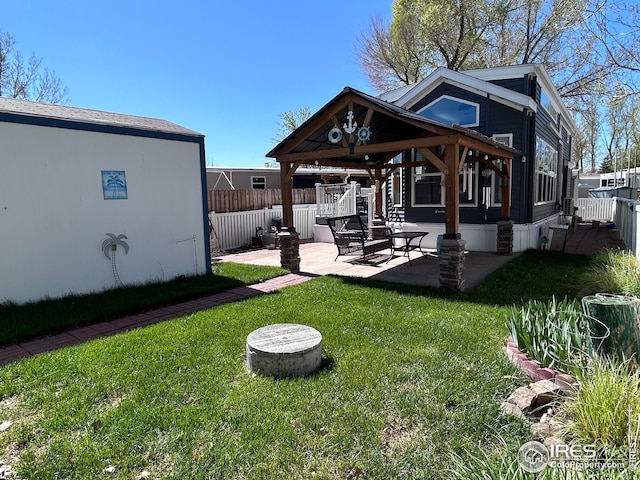 view of yard with a gazebo, a patio area, and fence